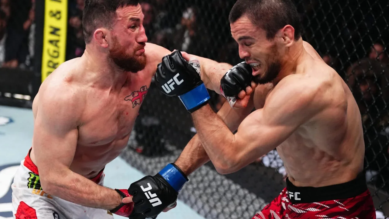 Мераб Двалишвили победил Умара Нурмагомедова, защитив титул на UFC 311